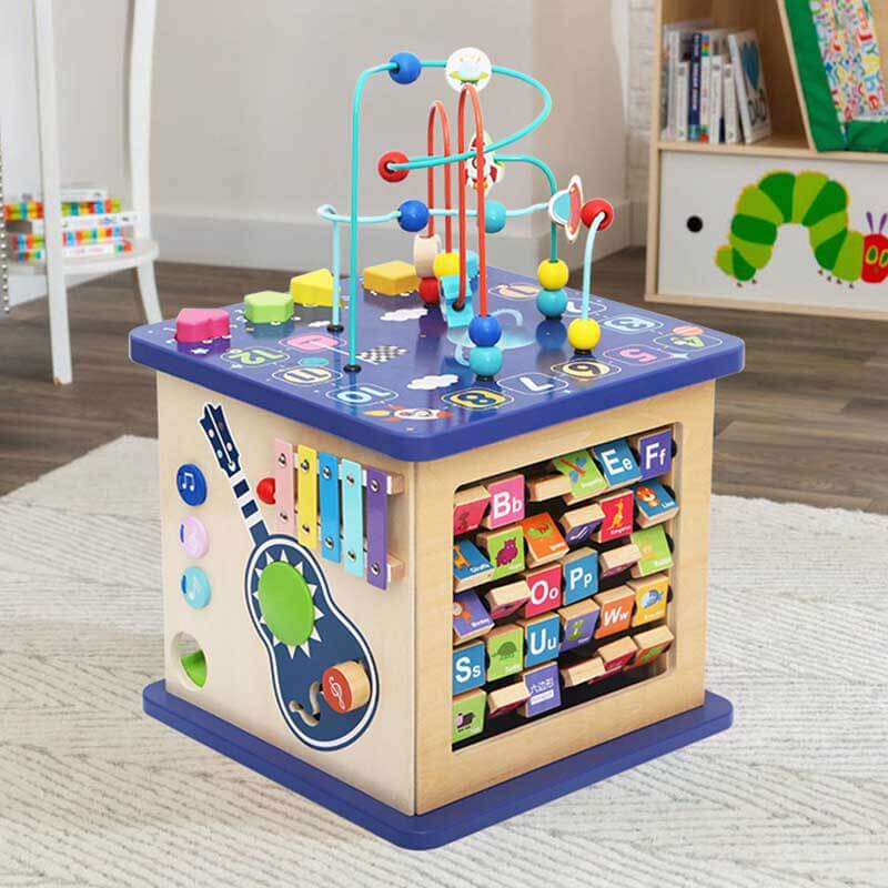 Wooden sensory busy house toy, designed for toddlers to explore and learn through play.