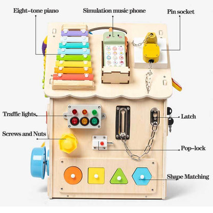 Side view of a wooden sensory busy house for toddlers, showcasing multiple interactive features.
