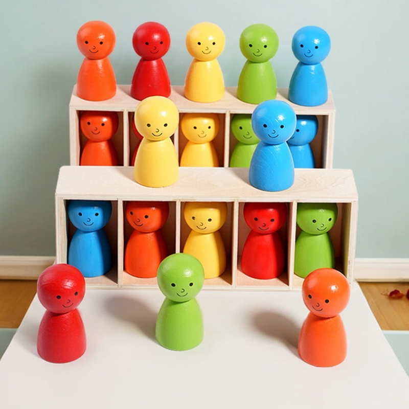 Child concentrating on placing pegs in a Montessori wooden color matching game, fine motor skill practice