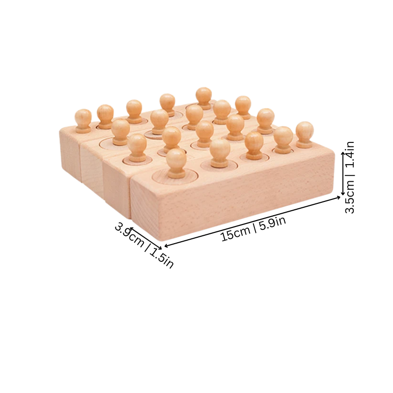 Toddler playing with colorful wooden Montessori cylinder blocks, educational developmental toy for kids activity