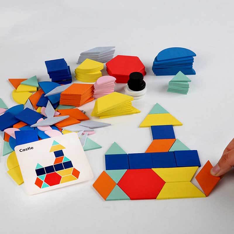 Set of colorful wooden tangram geometry blocks arranged as a puzzle, an educational toy for kids' development