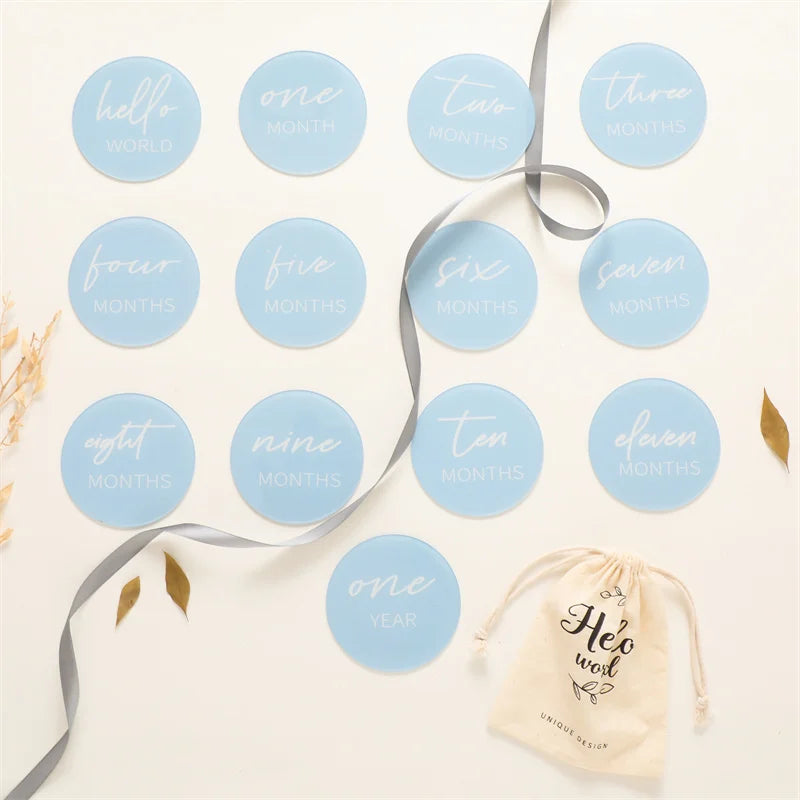 Newborn 13-piece acrylic milestone card set, ideal for baby shower gifts and photo shoots