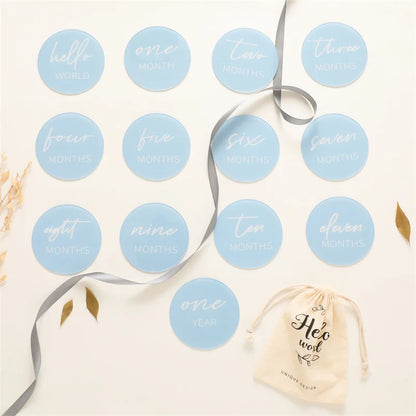 Newborn 13-piece acrylic milestone card set, ideal for baby shower gifts and photo shoots