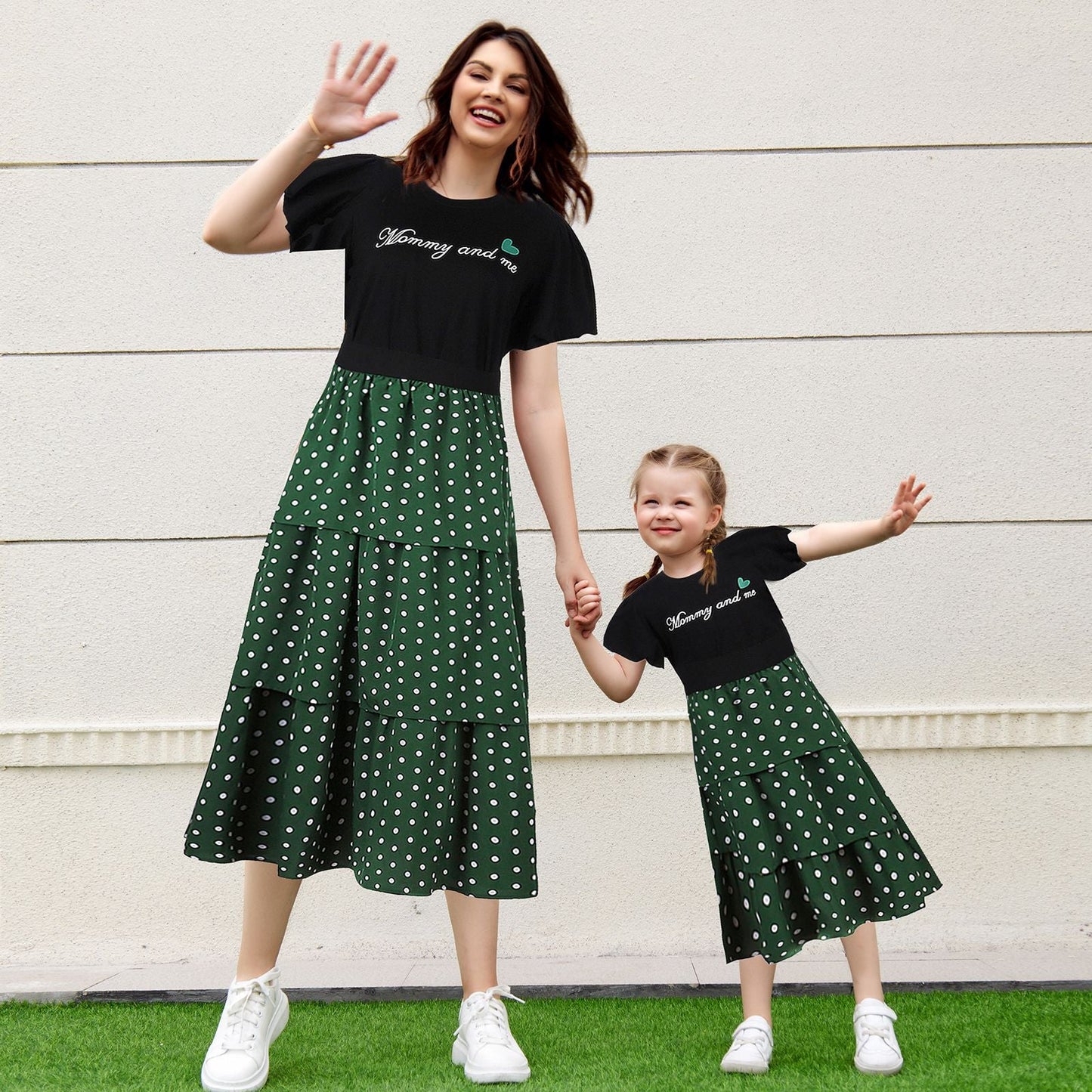 Family matching outfit set featuring a black polka dot skirt and a 'LOVE' graphic white short-sleeve shirt.