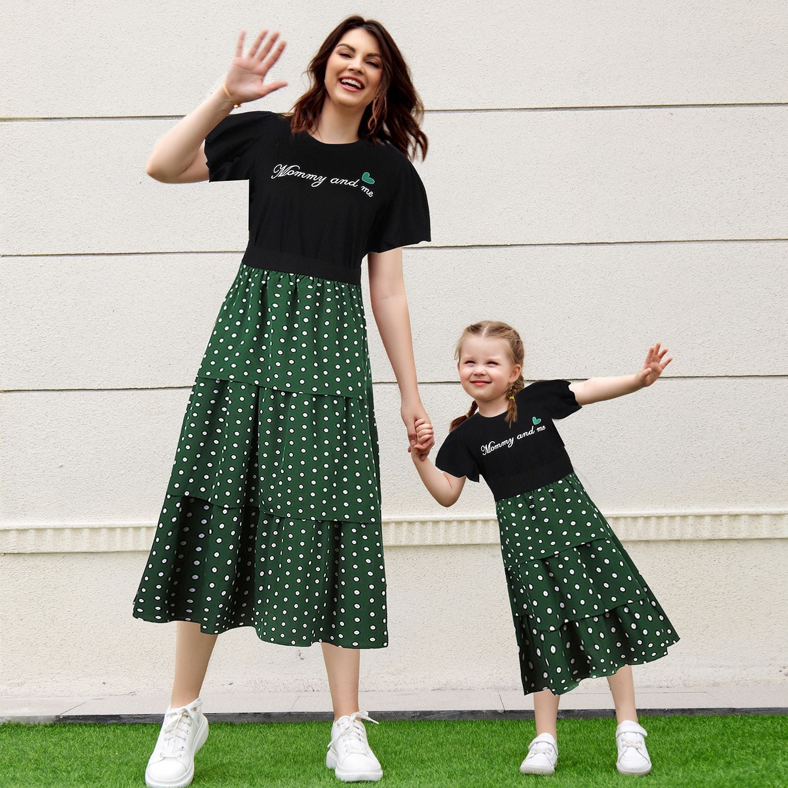 Family matching outfit set featuring a black polka dot skirt and a 'LOVE' graphic white short-sleeve shirt.