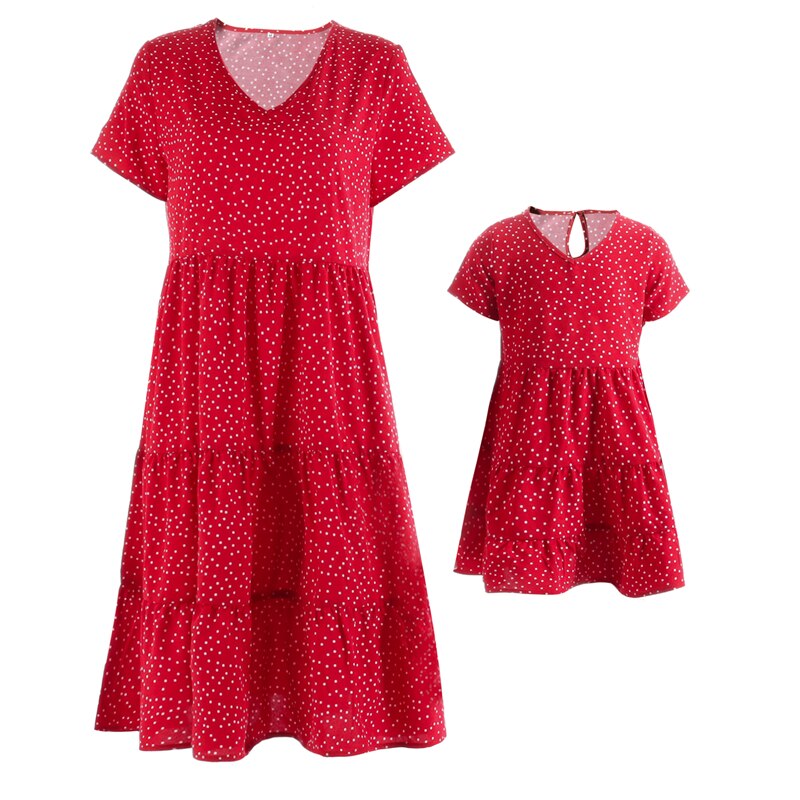 Mom and daughter wearing coordinating short sleeve V-neck dresses, ideal for girls clothes
