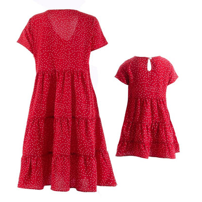 Close-up of fabric detail on a mother daughter matching V-neck short sleeve dress