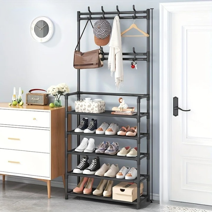 Space-saving multi-layer coat rack with shoe storage shelf for small entryways; black steel frame, modern design.