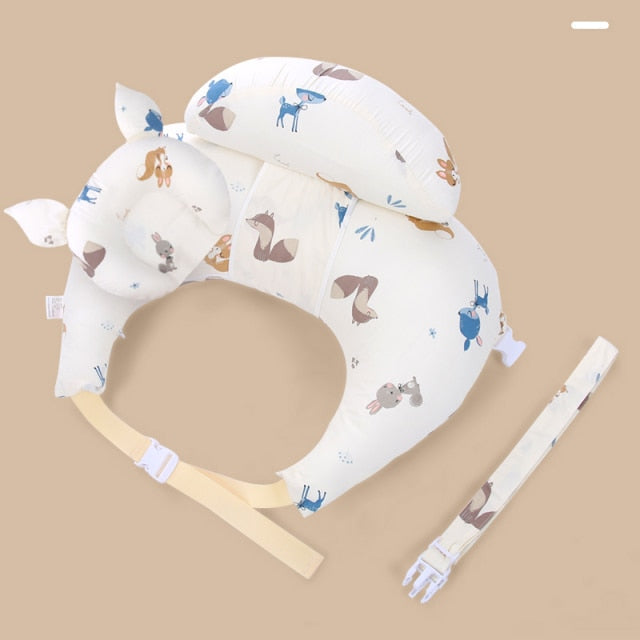 Compact nursing pillow for infants, featuring a removable headrest for adaptable tummy time play