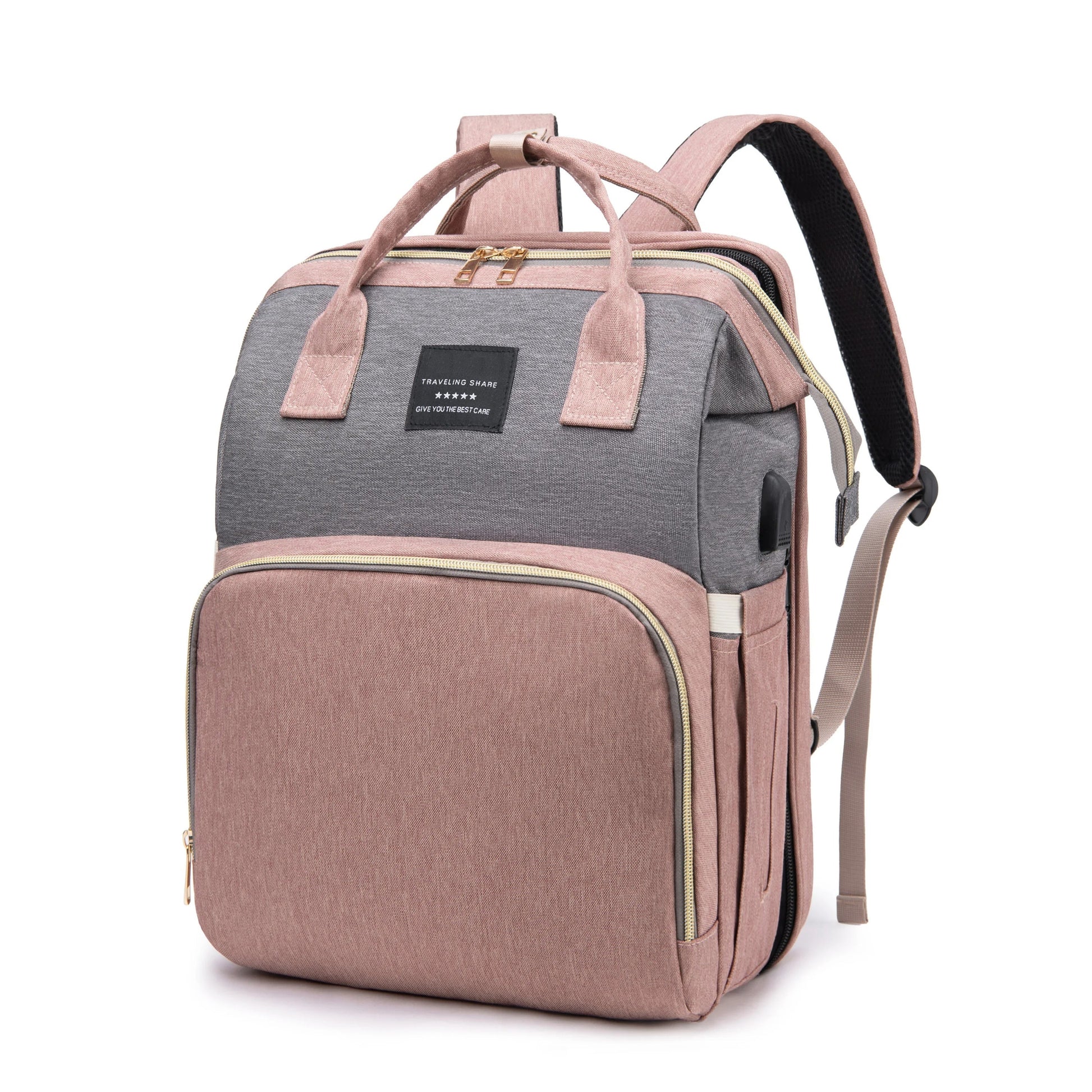 Back view of the grey diaper bag worn as a backpack, highlighting its ergonomic design and carry straps