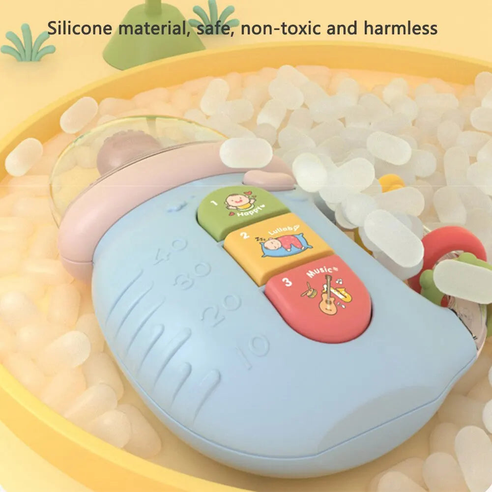 Baby silicone pacifier feeding bottle with musical melodies and an integrated night light.