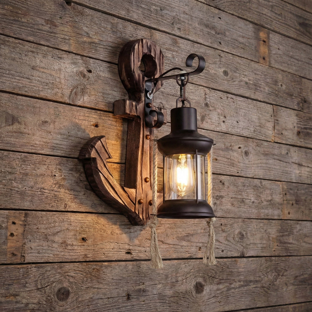 Decorative coastal anchor wall sconce, enhances nautical home decor with charming LED light & seaside style.