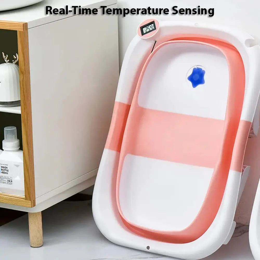 Gray infant bathtub with safety sensor and digital thermometer showing water temperature