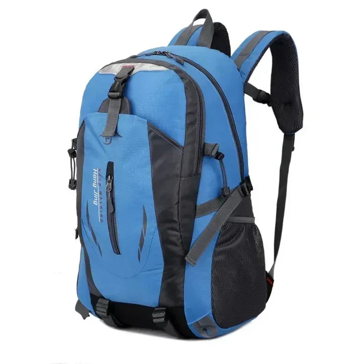 Spacious multi-compartment waterproof travel bag, fully packed with essentials for travel or outdoor adventures.