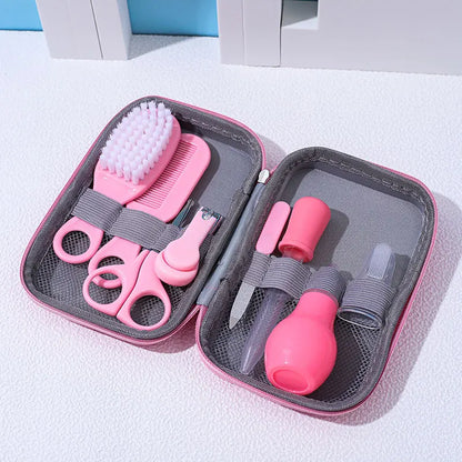 Detailed shot of the baby nasal aspirator and medicine dropper from the health kit