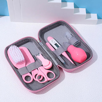 8-piece baby essentials kit in a compact case, perfect for new parents and maternity gift