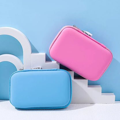 Infant grooming set featuring safety scissors, nail file, and tweezers in a blue case