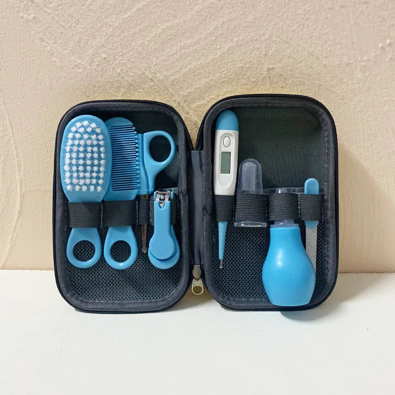 Pink newborn baby care kit showing all 8 hygiene tools neatly organized for traveling