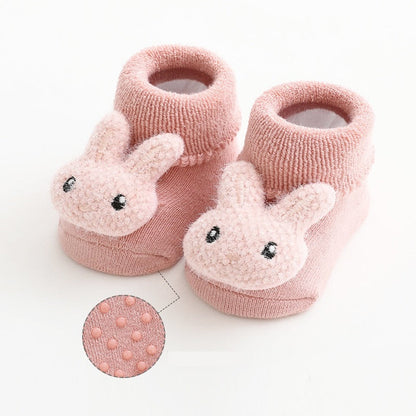 Detail shot of the elastic cuff on anti-slip infant socks, ensuring a snug fit without marks
