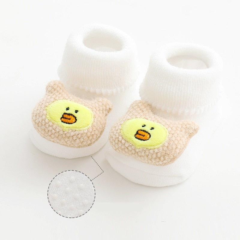 Close-up of anti-slip grip on the sole of a baby walking sock, ensuring safe indoor play