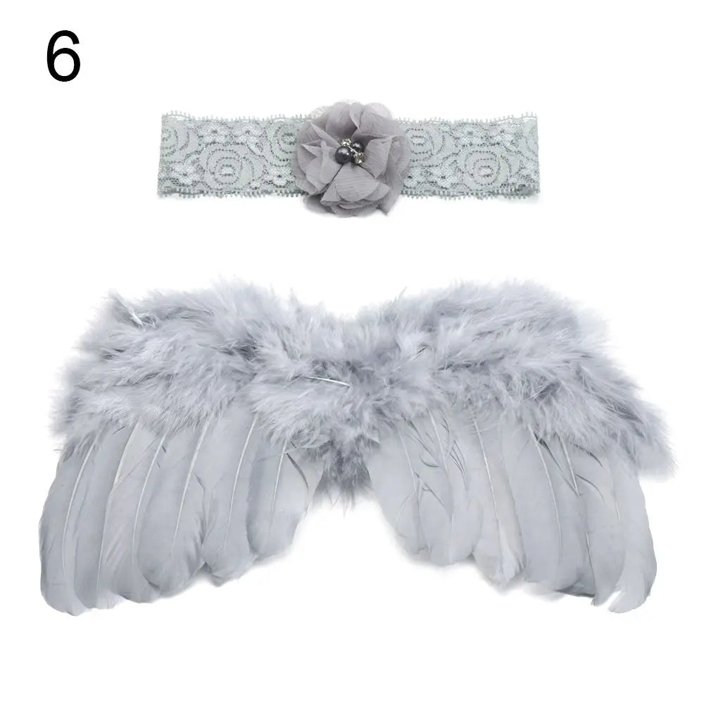 Adorable newborn angel wings, feather detail, alongside a colorful flower headband, baby prop