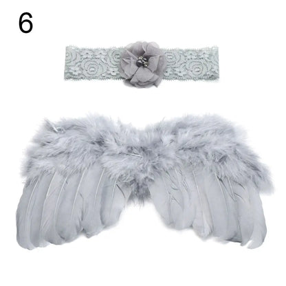 Adorable newborn angel wings, feather detail, alongside a colorful flower headband, baby prop