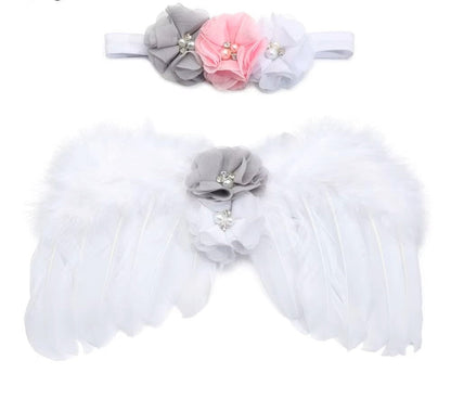 Baby accessories: angelic feather wings and delicate flower headband, ideal for infant pics