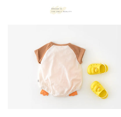 Comfortable white short sleeve cotton baby bodysuit, essential infant apparel for warm weather.