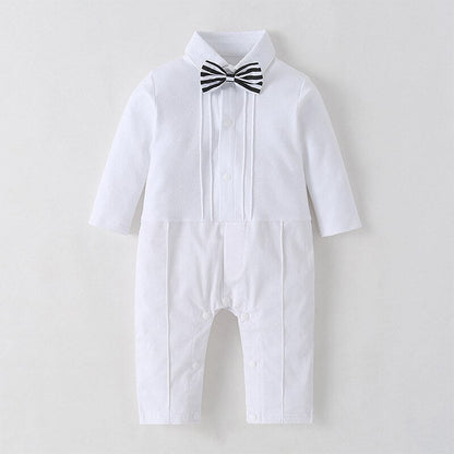 Close-up of newborn formal wear: white romper with blazer, ideal for christening or baptism