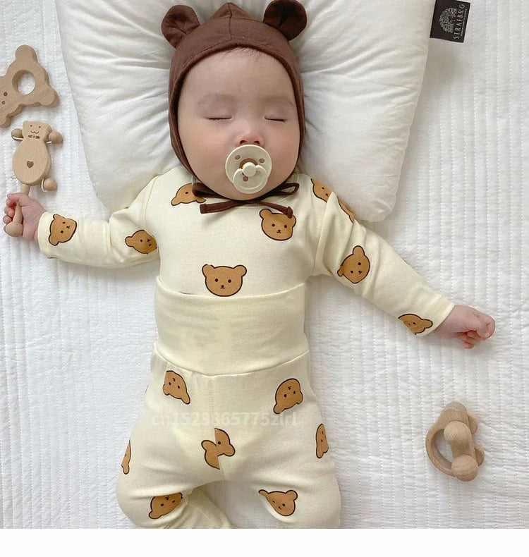 Close-up of soft cotton fabric on a baby casual top and pant set, gentle newborn clothing.