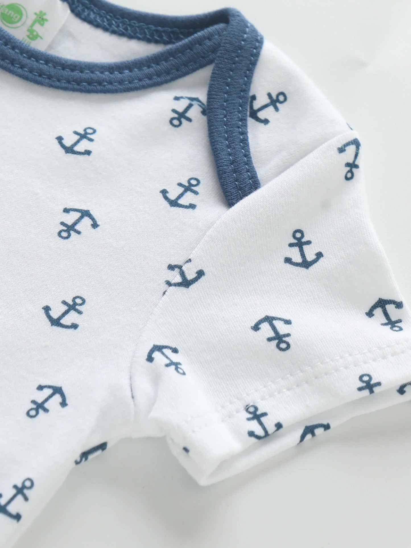 Cotton graphic romper, durable infant bodysuit for active newborns, unisex design