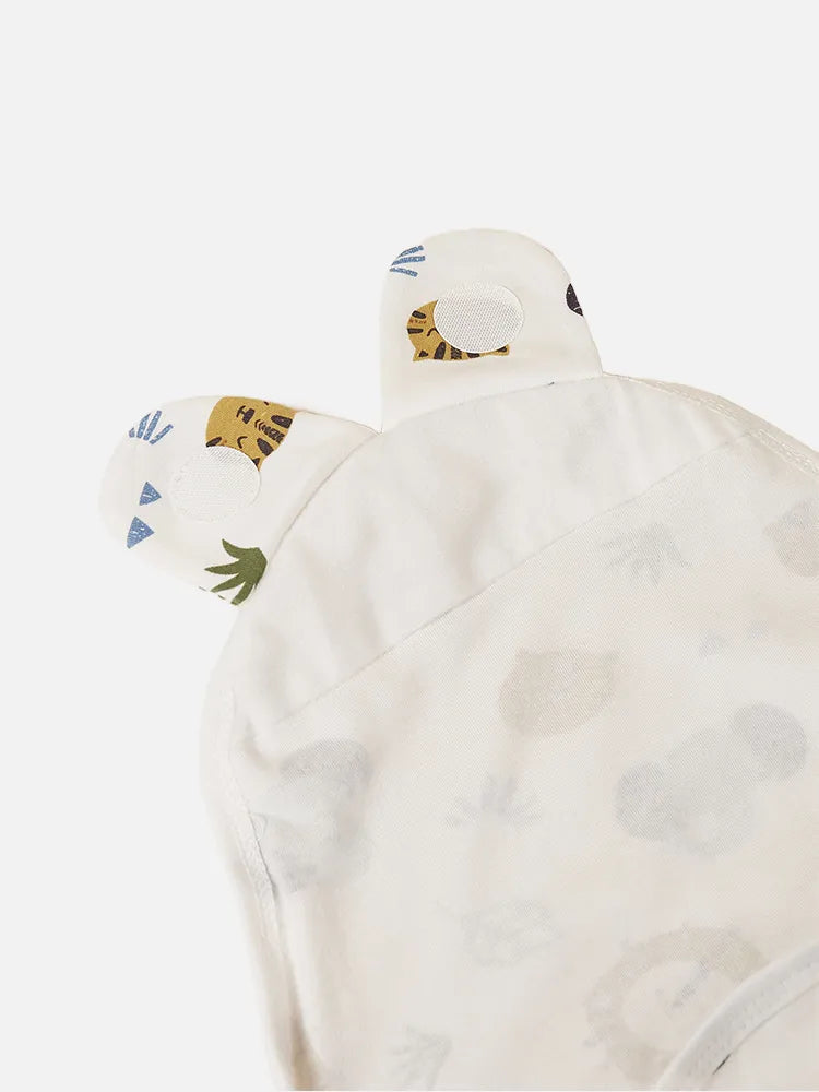 Essential newborn swaddle sleepsack made from 100% cotton, ideal for comfortable baby sleep.