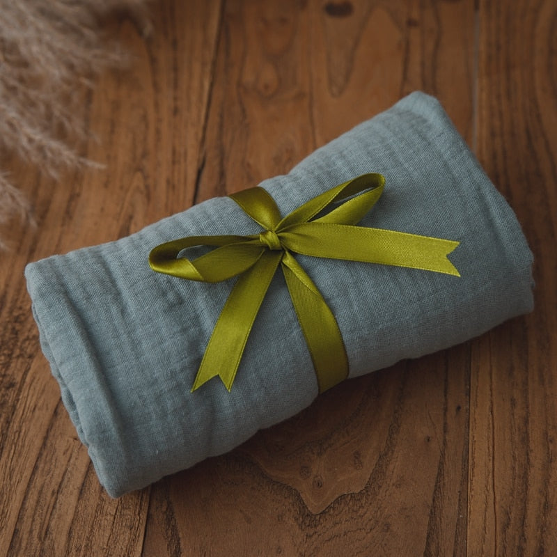 All items from the Newborn Baby Gift Set displayed together: blanket, rattle, brush, comb, towel