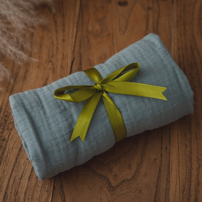 All items from the Newborn Baby Gift Set displayed together: blanket, rattle, brush, comb, towel