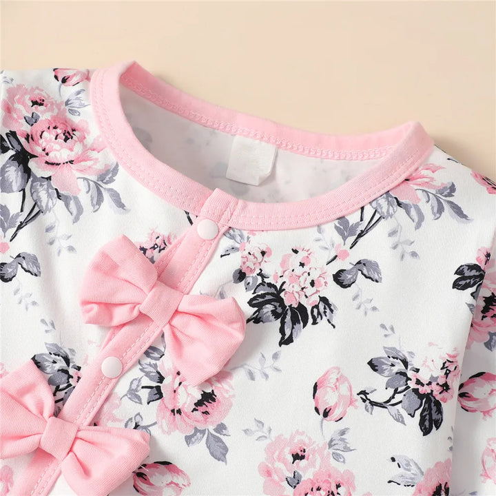 Soft baby girl long sleeve floral romper and hat set, perfect infant clothing.