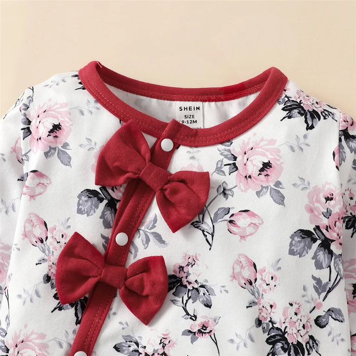 Cotton blend floral baby girl romper and hat set, essential infant fashion.