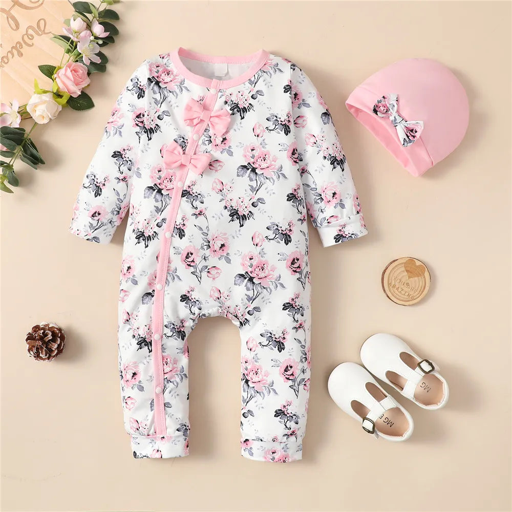 Cute baby girl floral romper and hat set, perfect spring or autumn newborn outfit.