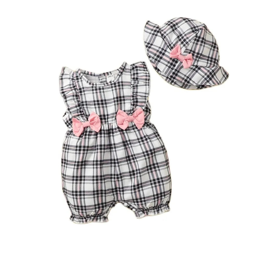 Newborn baby girl in a sleeveless pink and white plaid romper, perfect for summer casual wear.