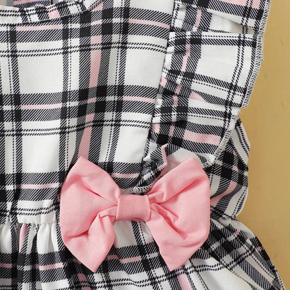 Front view of a newborn baby girl's pink and white plaid romper, a stylish summer outfit.