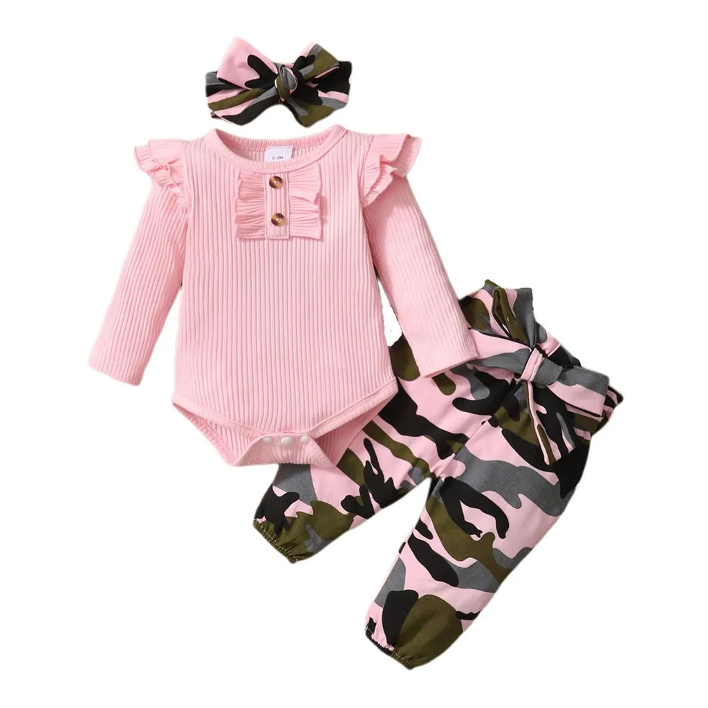 Adorable baby girl wearing her new 3-piece pink outfit, ideal infant gift.