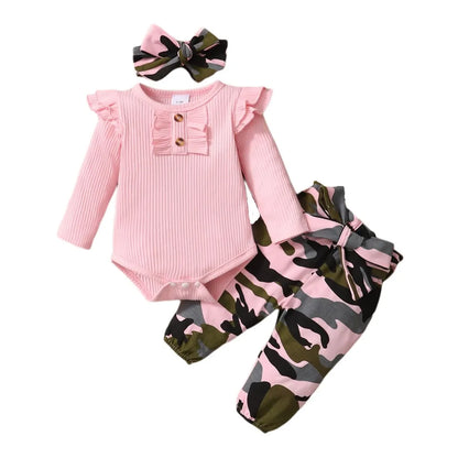 Adorable baby girl wearing her new 3-piece pink outfit, ideal infant gift.