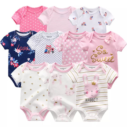 Newborn baby girl in soft pink cotton short sleeve bodysuit, comfy everyday wear