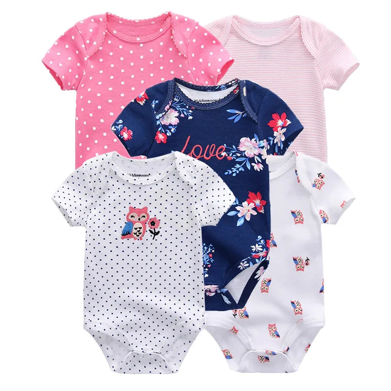Baby girl in a comfortable short sleeve cotton bodysuit, showcasing soft fabric