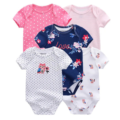 Baby girl in a comfortable short sleeve cotton bodysuit, showcasing soft fabric