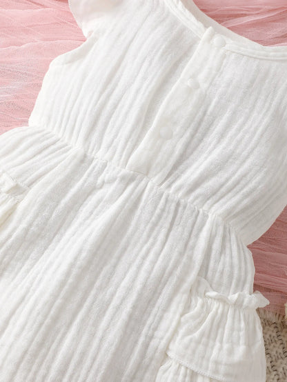 White cotton halter dress on a baby girl mannequin, showcasing its cute and classic summer outfit appeal.