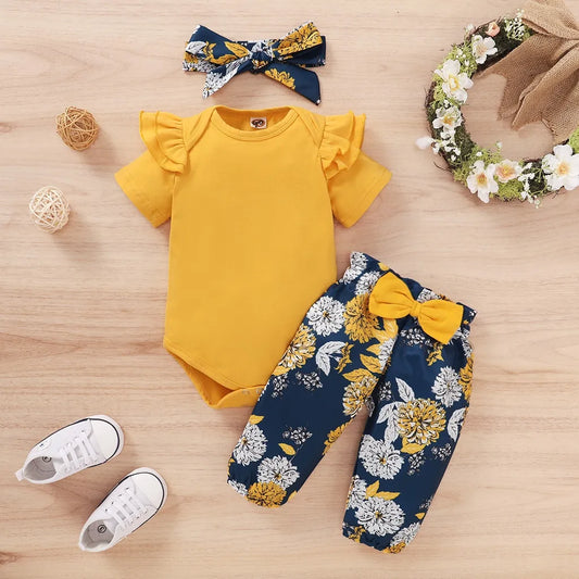 Newborn baby girl ruffle bodysuit and pants set with matching headband. Perfect infant cotton blend outfit.