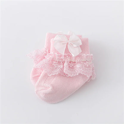 Soft cotton blend baby socks for girls, adorned with charming lace and princess bows