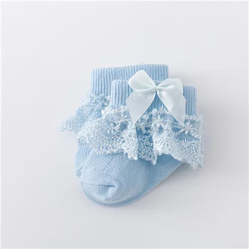 Delicate white lace baby socks with a single princess bow, high-quality infant garment