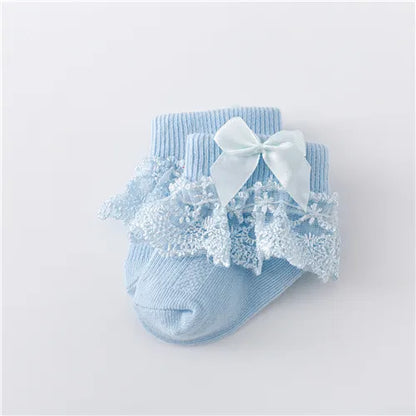 Delicate white lace baby socks with a single princess bow, high-quality infant garment