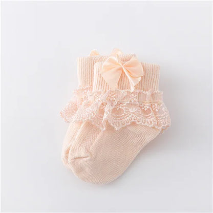Cotton blend newborn baby girl's socks featuring intricate lace and sweet princess bows